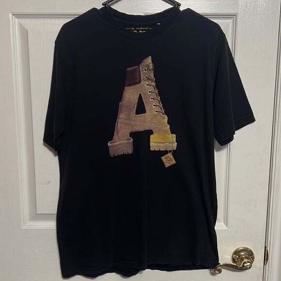 🔥🔥 AKOO BRAND & MFG. CO. - Black “Boot” Tee - Men Sz M - EXCELLENT Condition - Picture 1 of 7